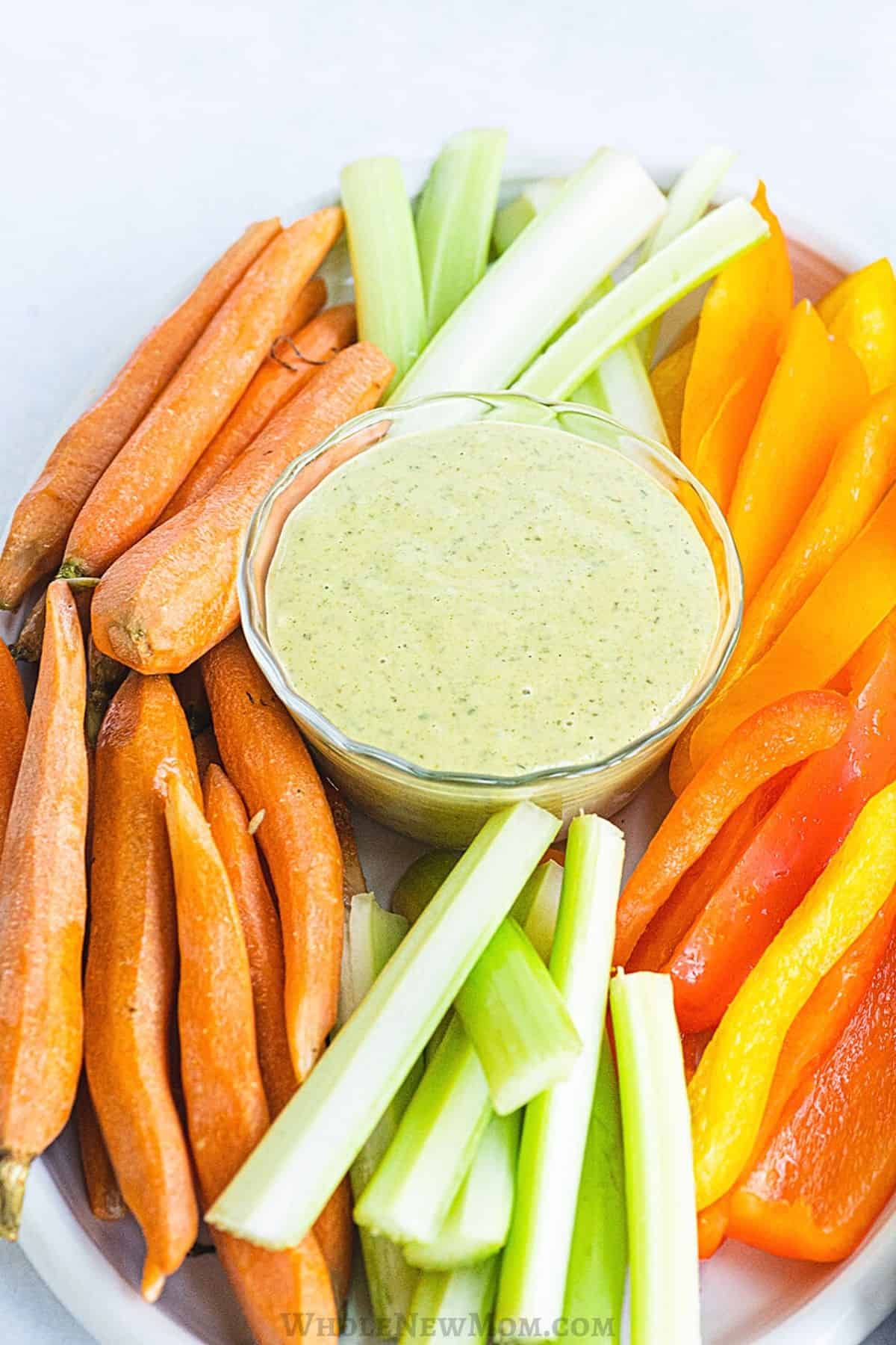 ranch dressing and some sliced vegetables