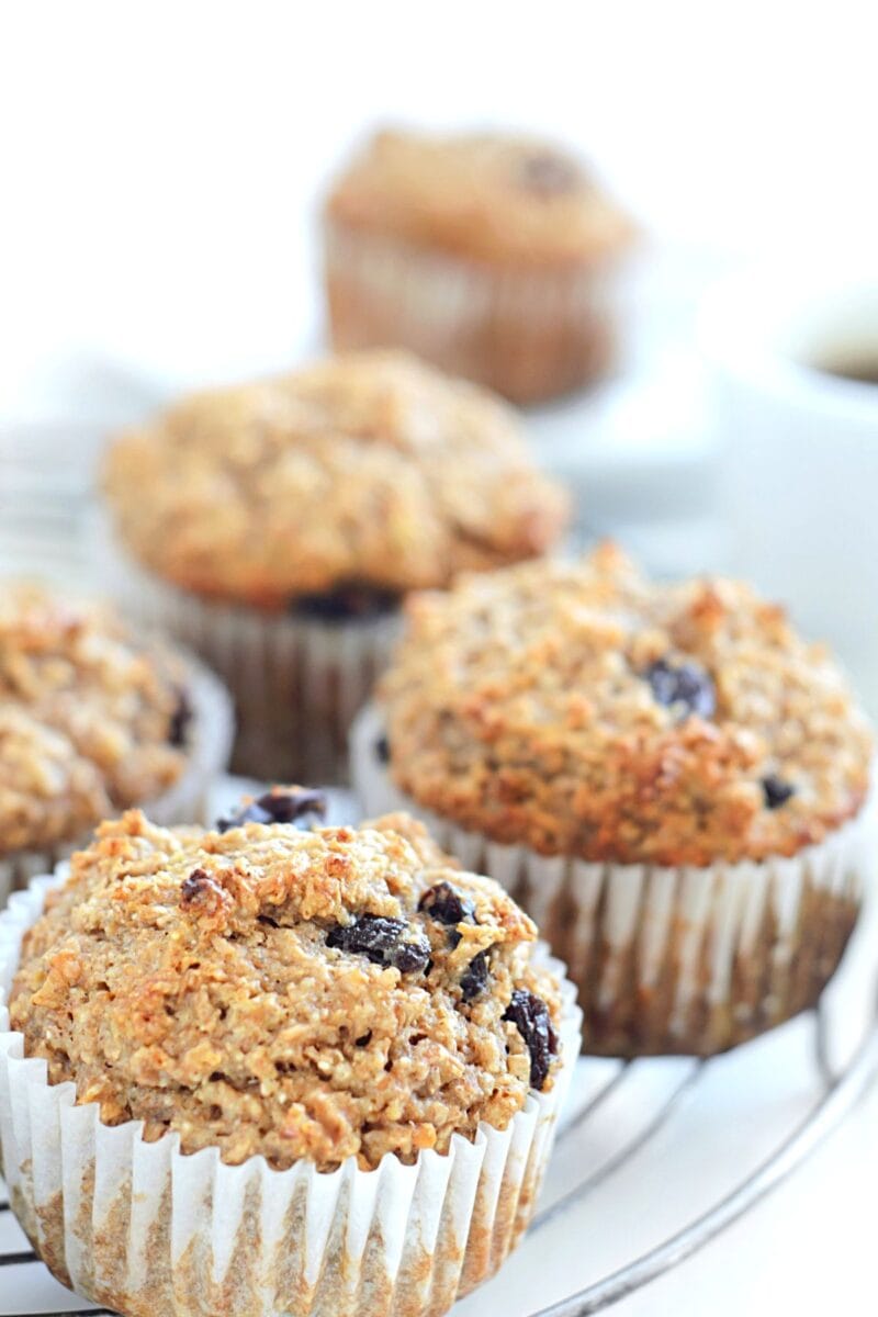 applesauce bran muffins on glass plate.