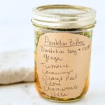 jar of homemade dandelion bitters.