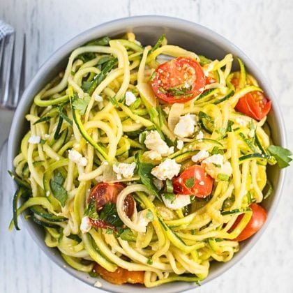 zucchini noodles with cherry tomatoes.