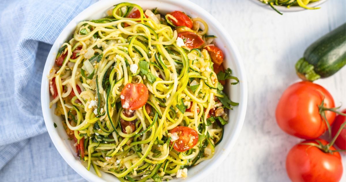 zucchini noodles with cherry tomatoes.