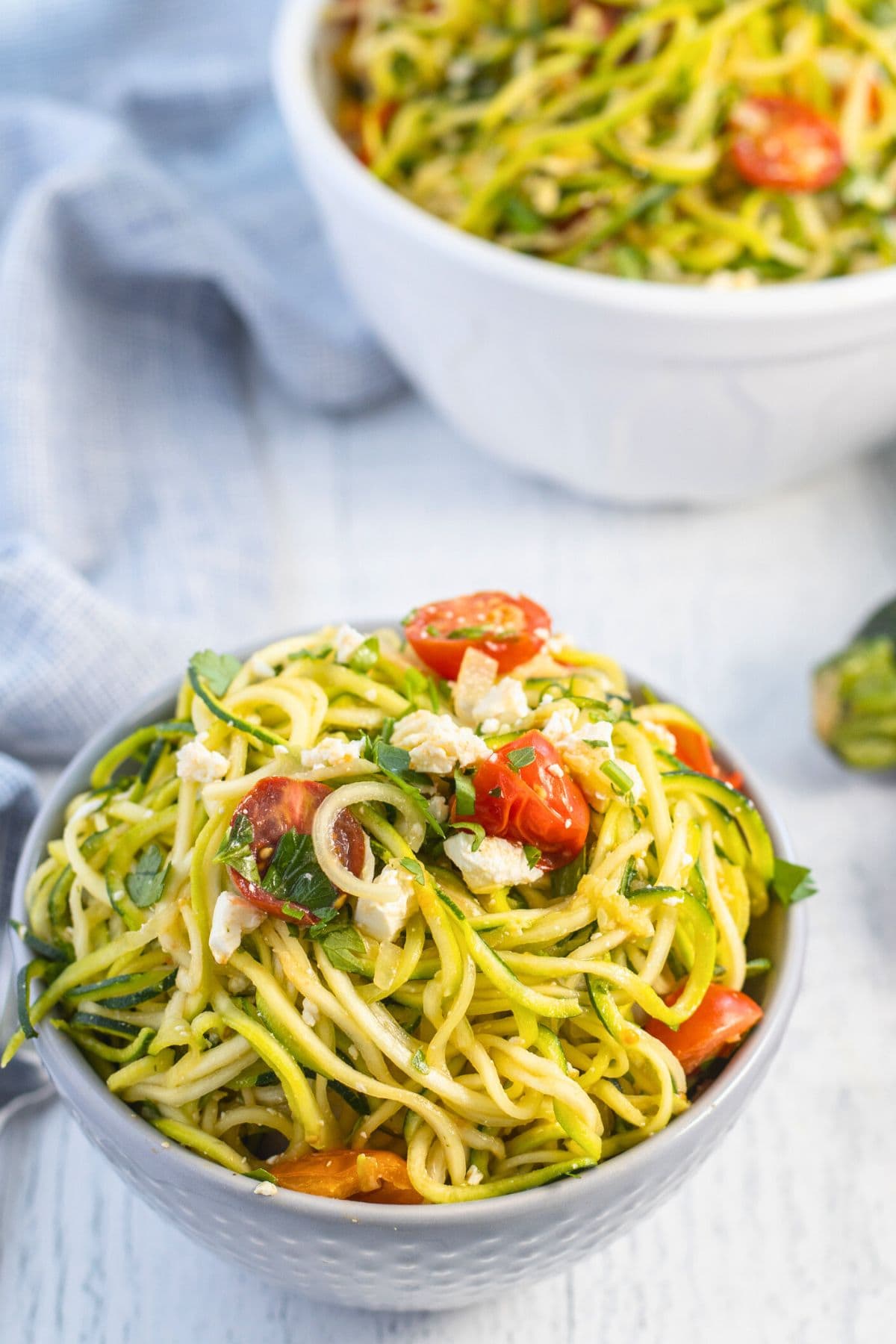 zucchini noodles with cherry tomatoes.