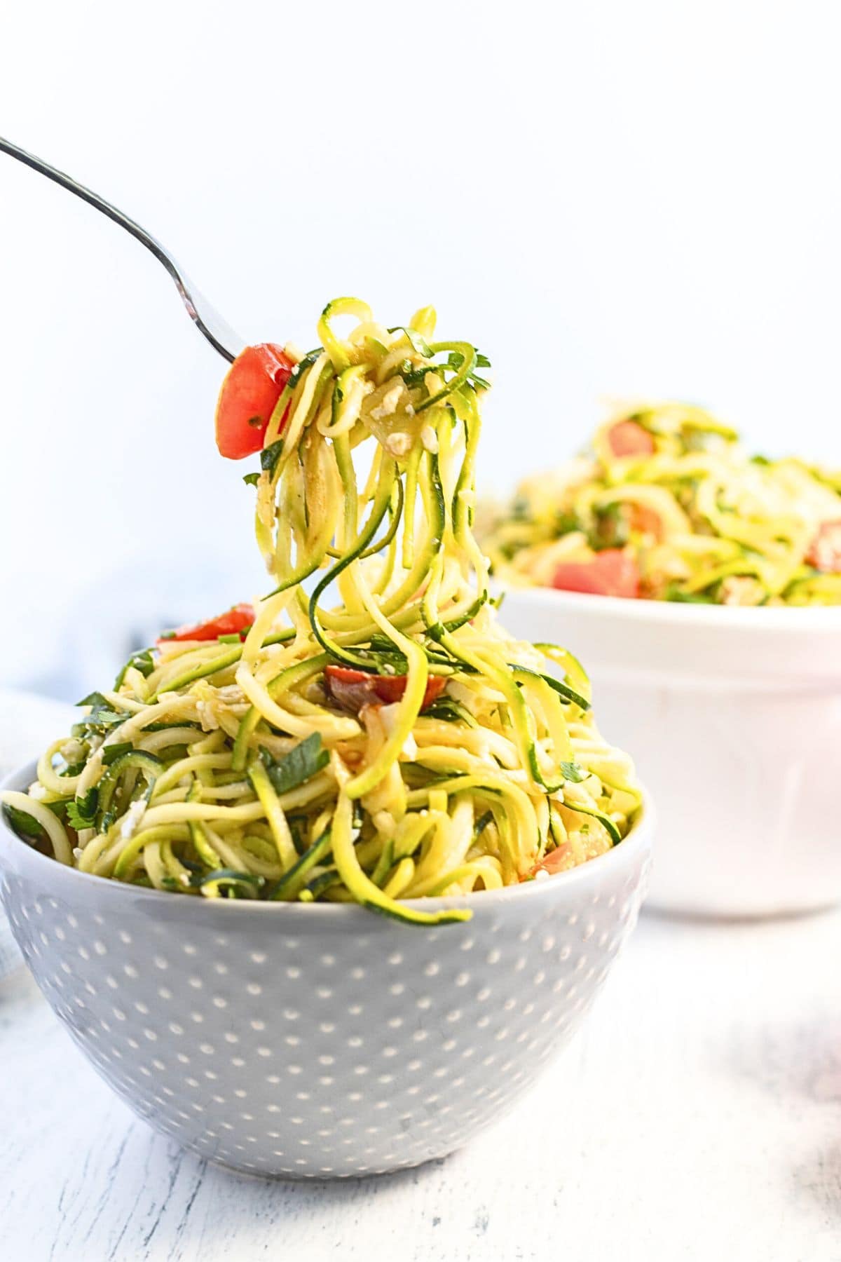 zucchini noodles with cherry tomatoes.