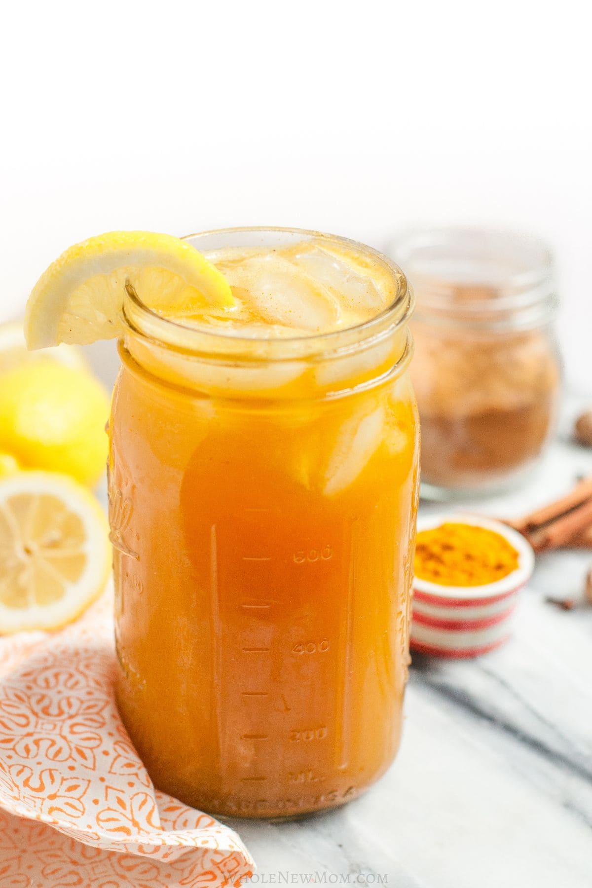 adrenal cocktail powder and homemade adrenal cocktail in large mason jar.