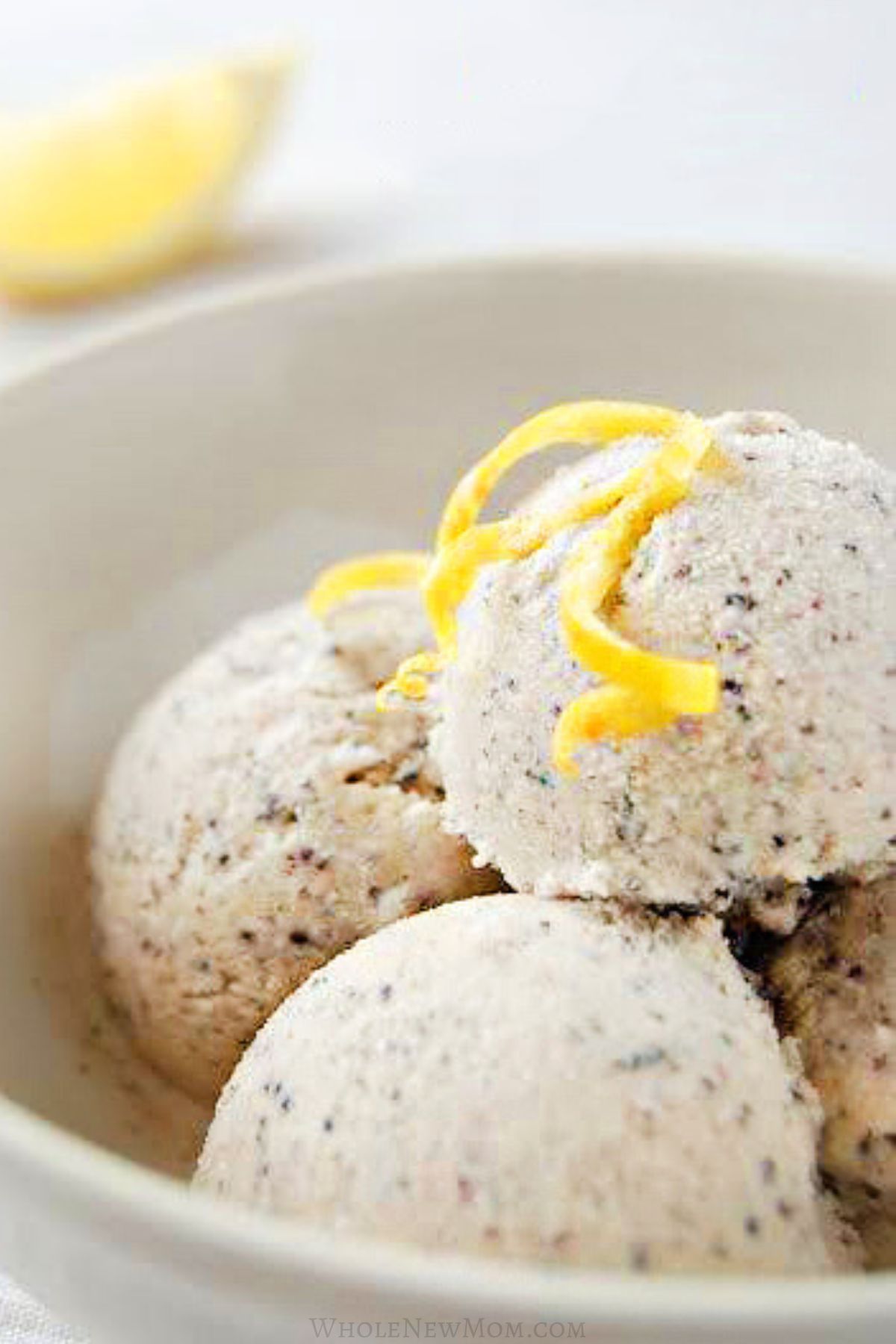 healthy lemon poppy seed ice cream in bowl.