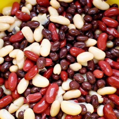 cooked beans in a colander.