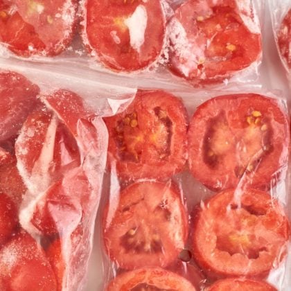 frozen tomato halves in bags for post about how to freeze tomatoes.