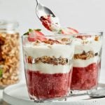 coconut yogurt parfaits in glass dessert cups.