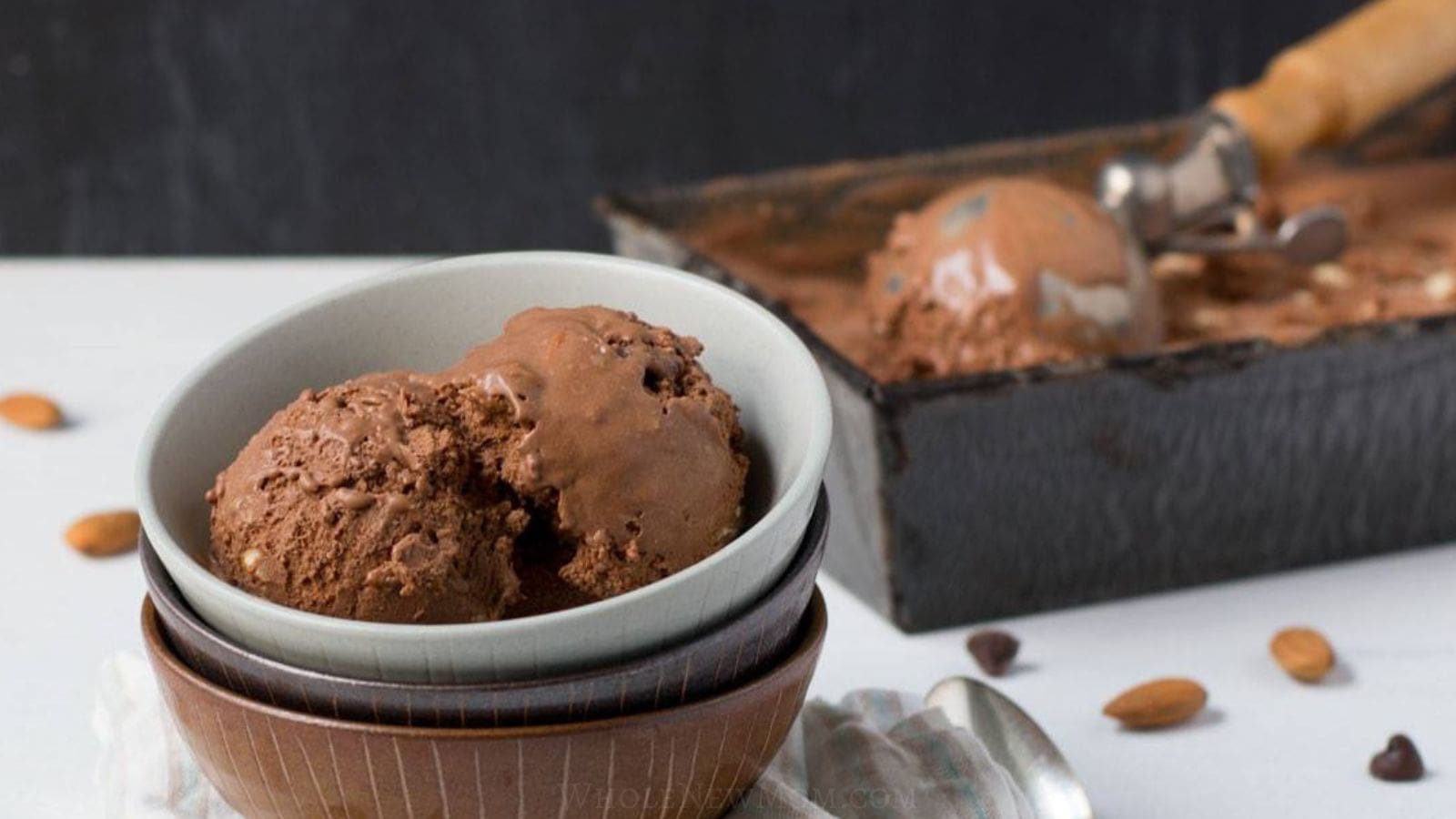 chocolate almond chip ice cream in bowls and tin.