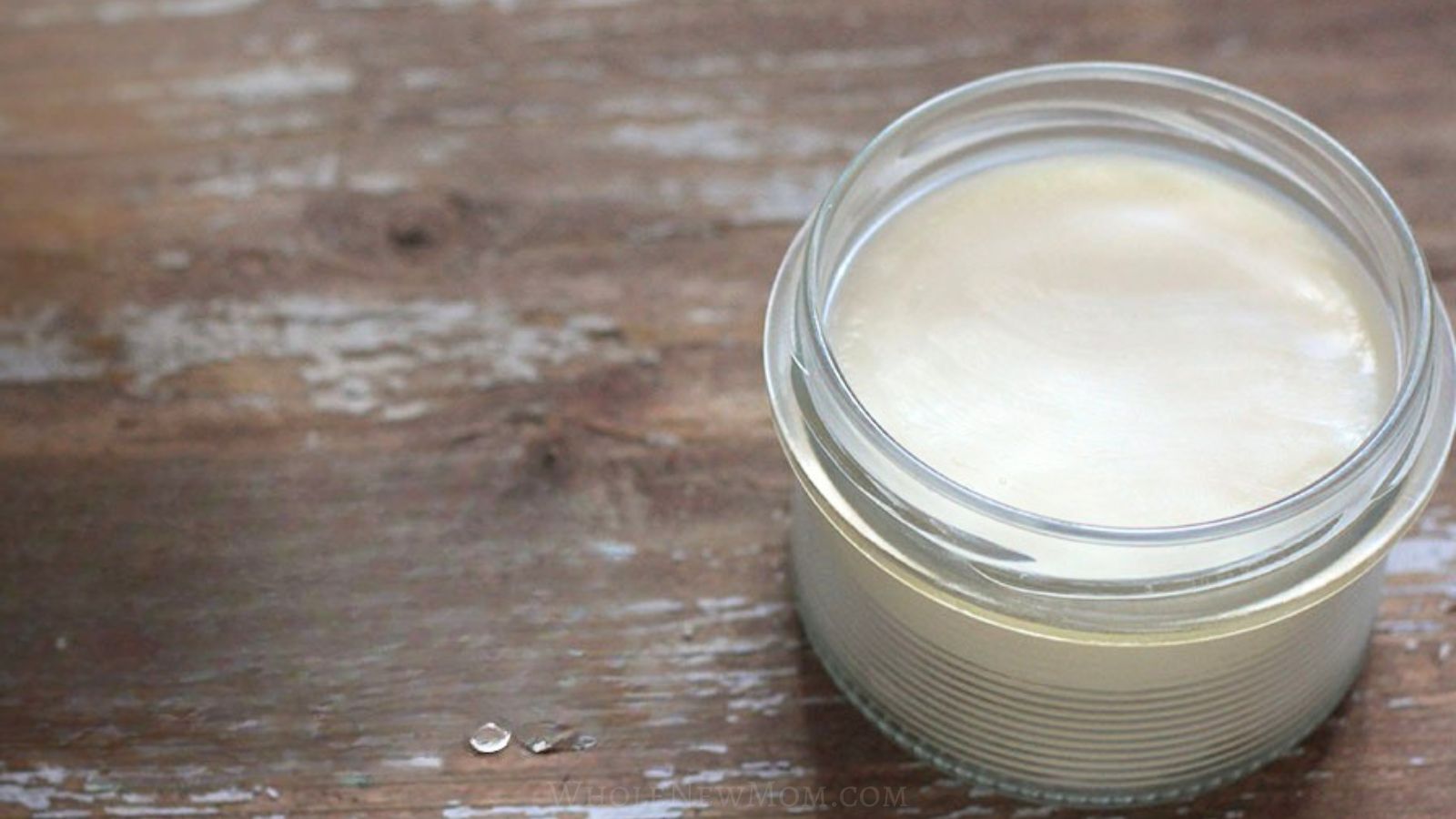 homemade hand cream in small glass jar.