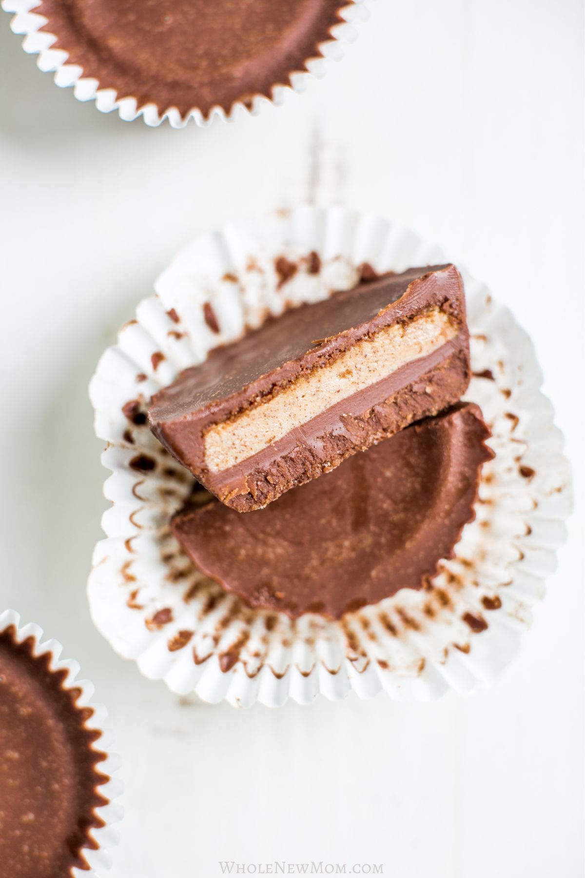 close up of cut keto almond butter cup.