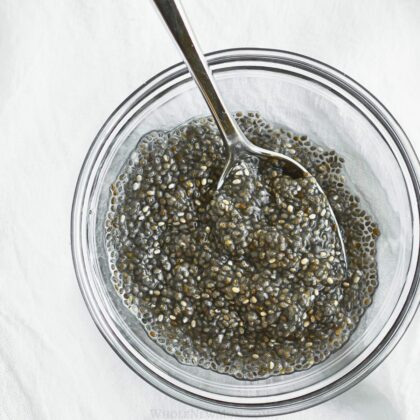 chia egg with spoon in small glass bowl.