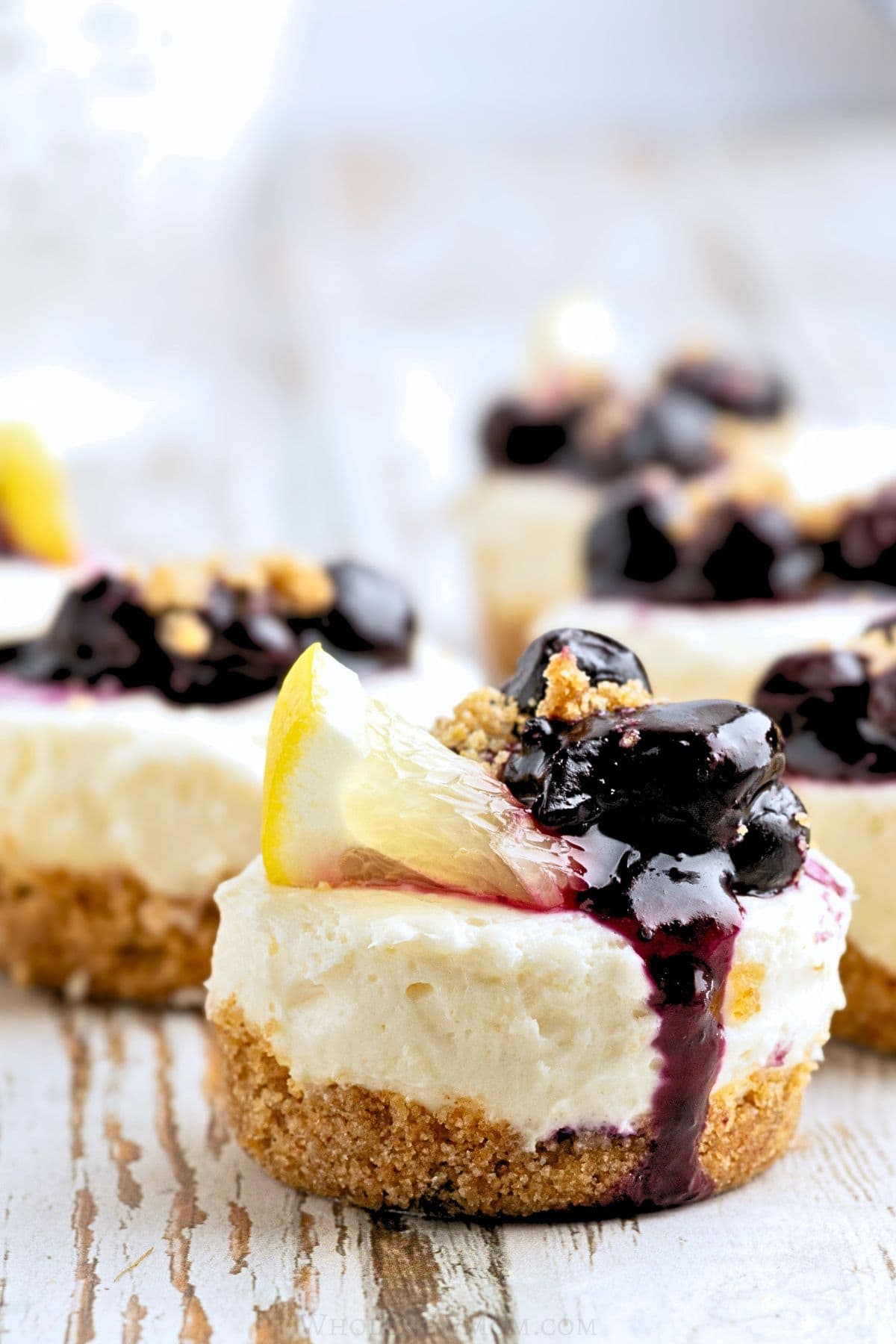 mini lemon blueberry no bake cheesecakes.