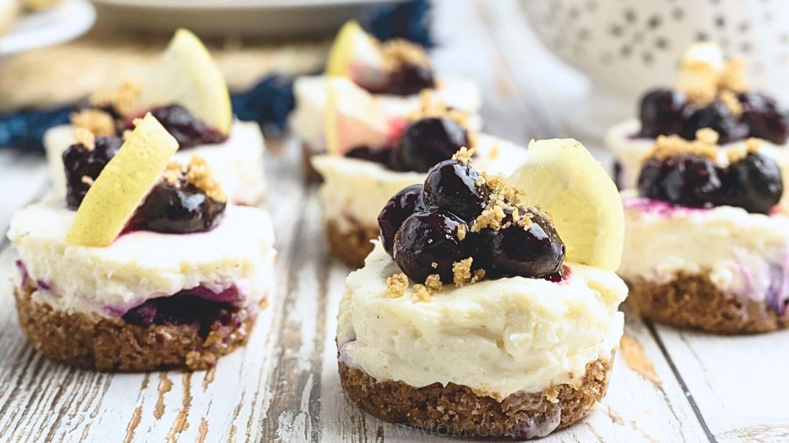 keto mini cheesecakes on table.