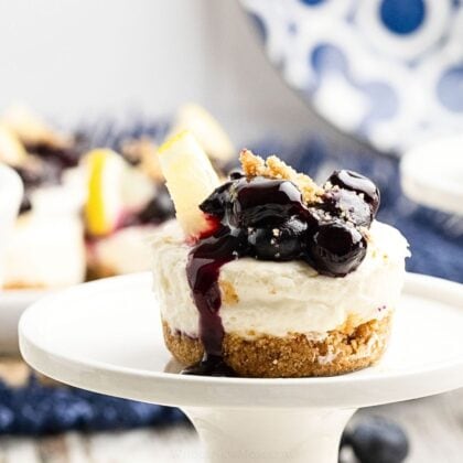 keto no bake cheesecake on pedestal.