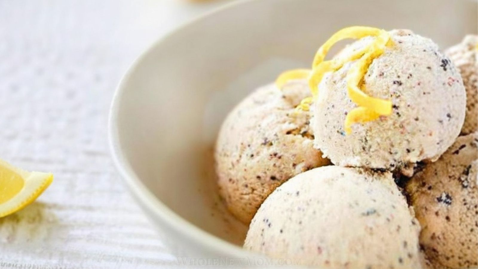 lemon poppyseed ice cream in bowl.