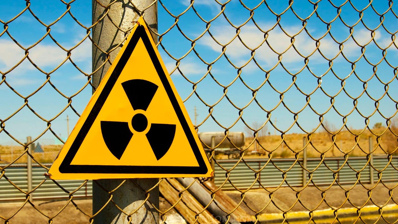 radiation danger sign on fence.
