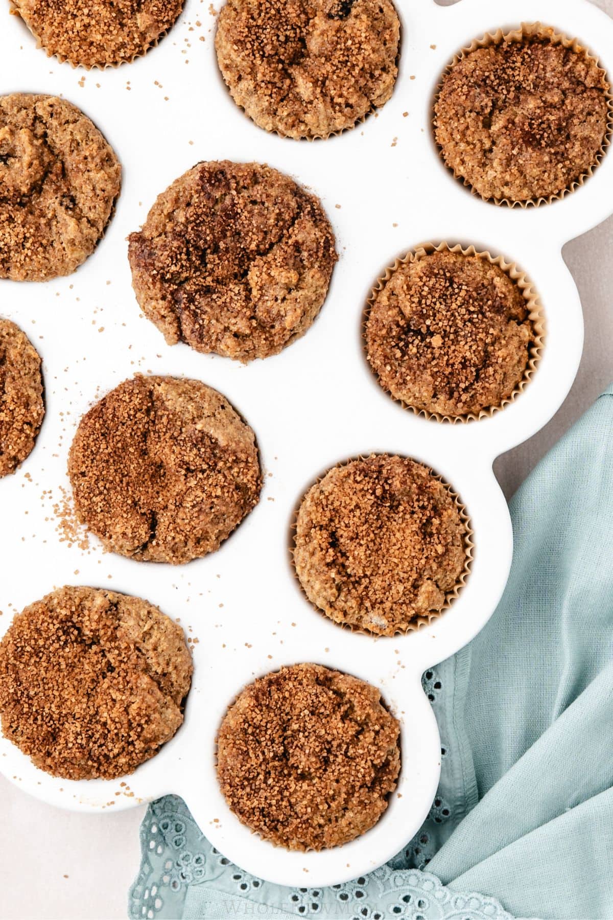 healthy bran muffins with applesauce in muffin tin.