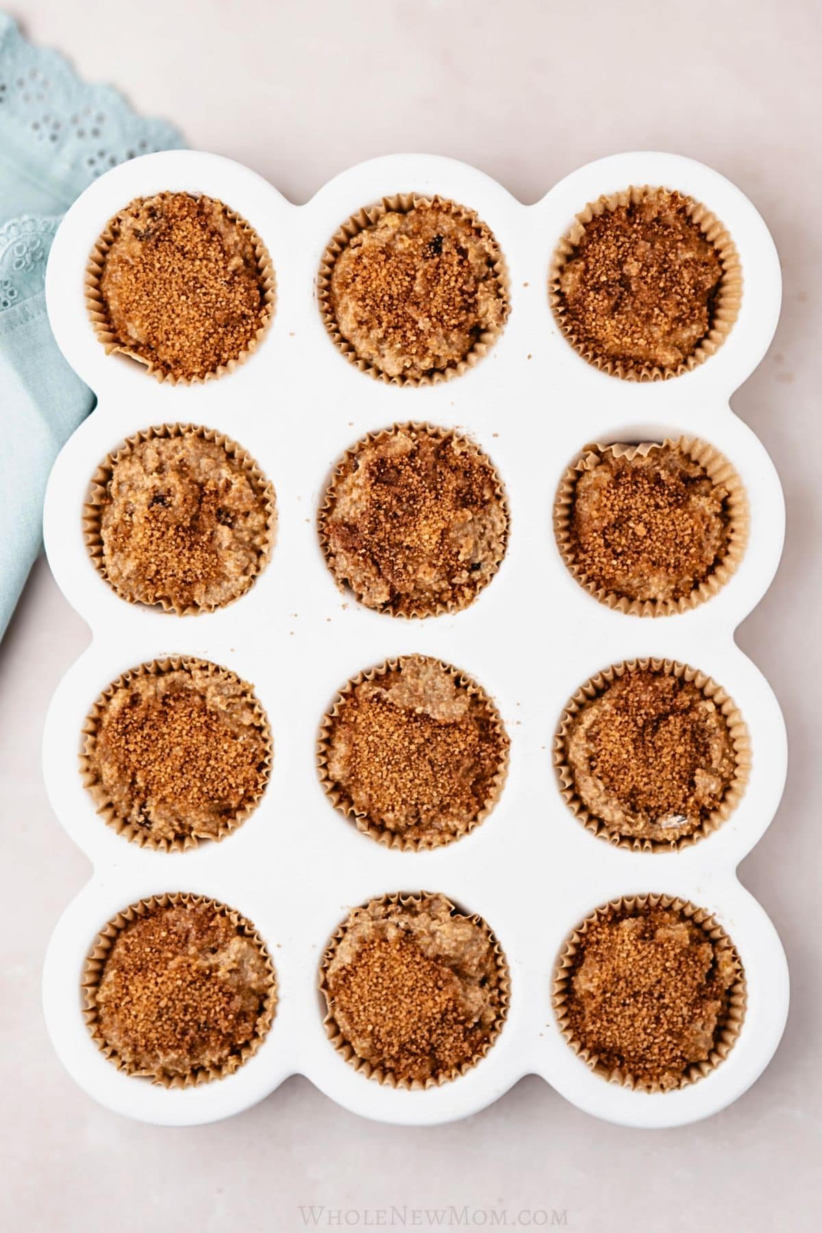healthy bran muffin batter in muffin tin.