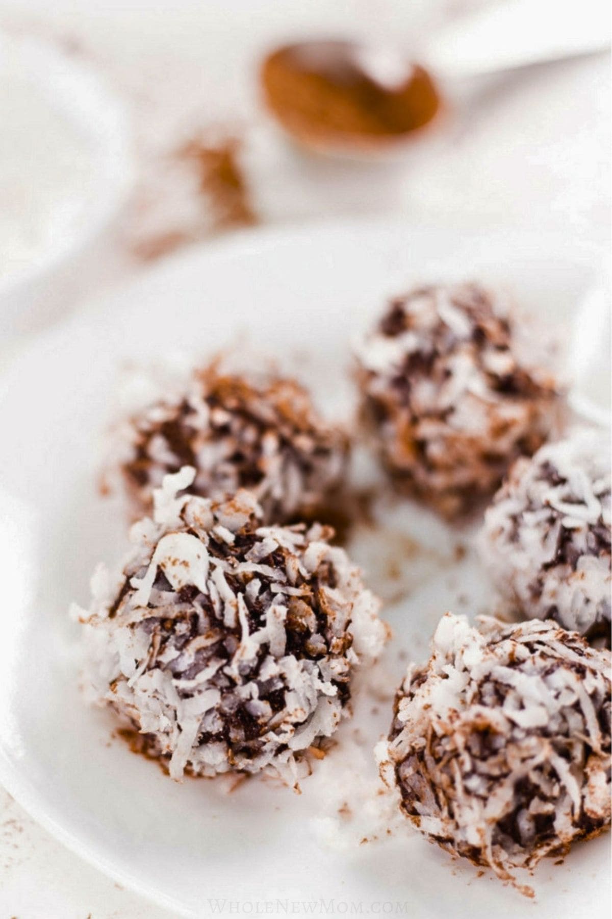 chocolate avocado truffles coated with coconut.
