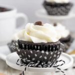 gluten free chocolate cupcake on stand.