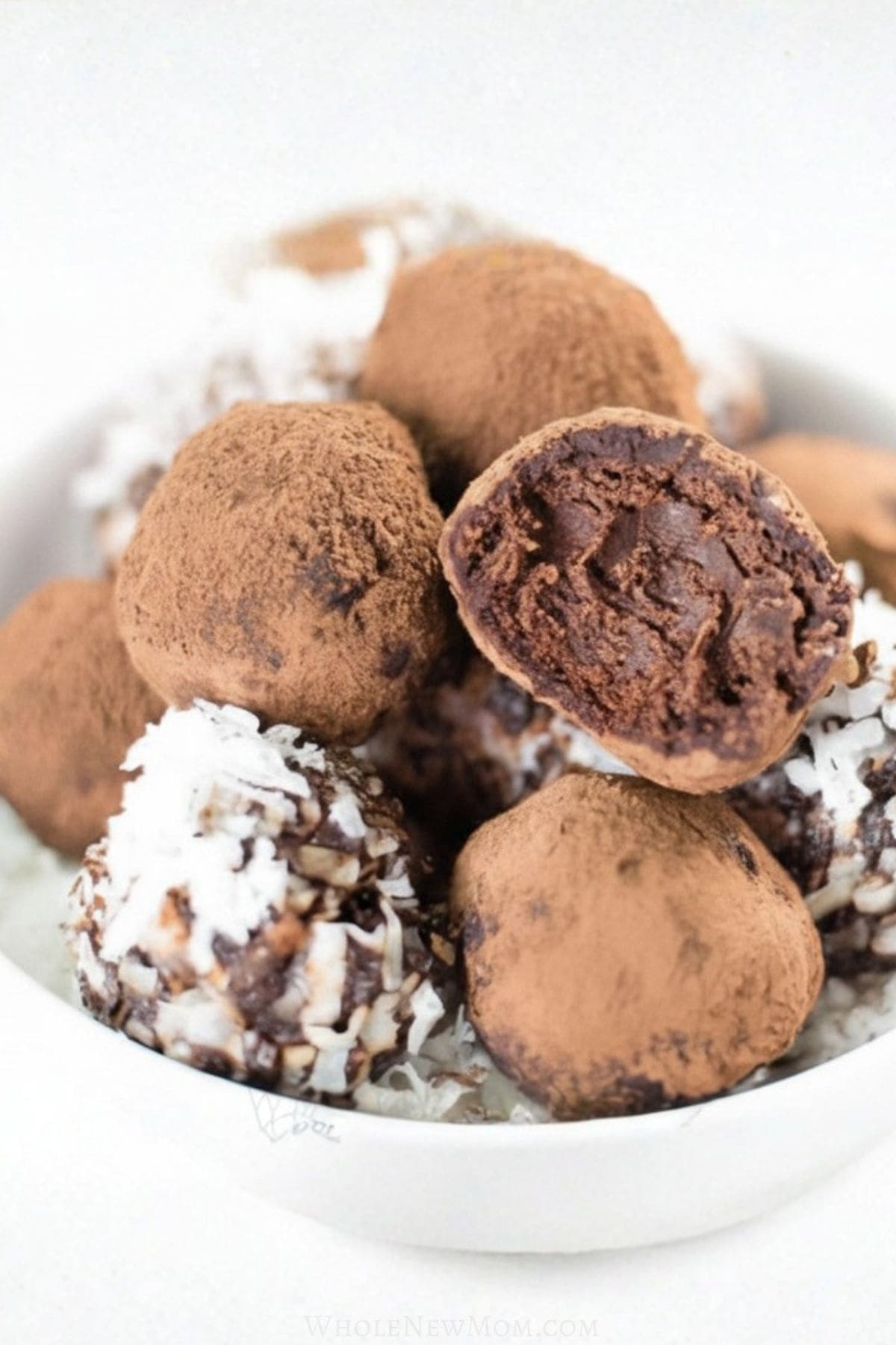 chocolate avocado truffles in white bowl.