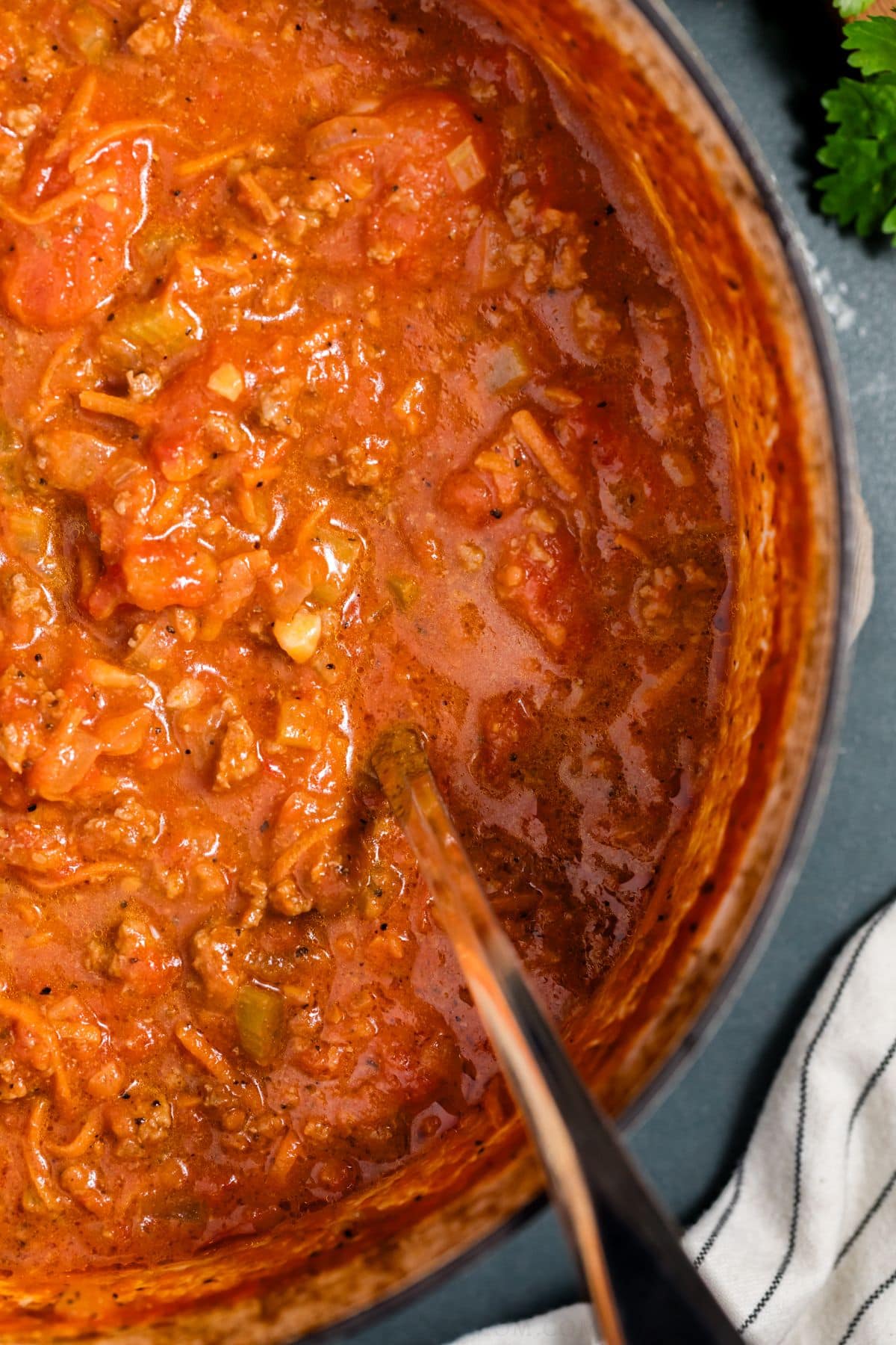 Close-up of beef bolognese sauce in a pot.