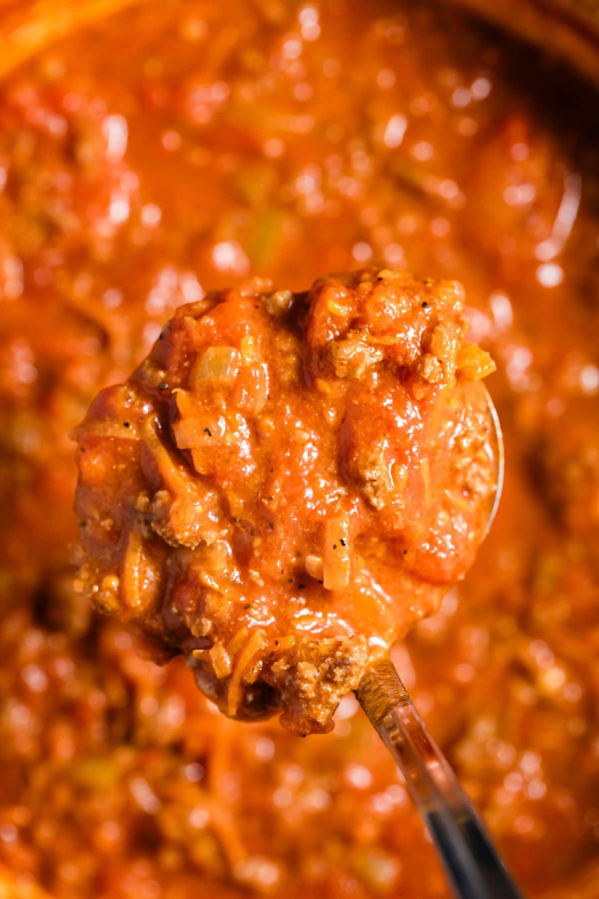 Spoonful of beef bolognese sauce.